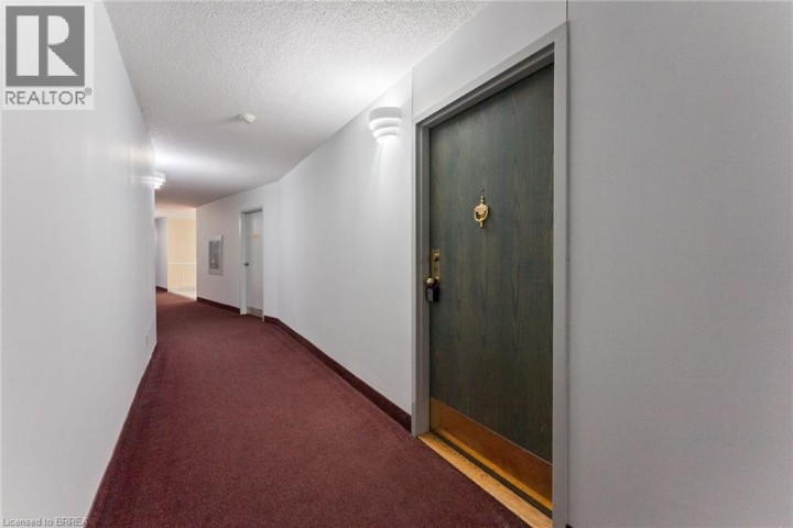 Photo 10 at 9 BONHEUR Court 212, Brantford