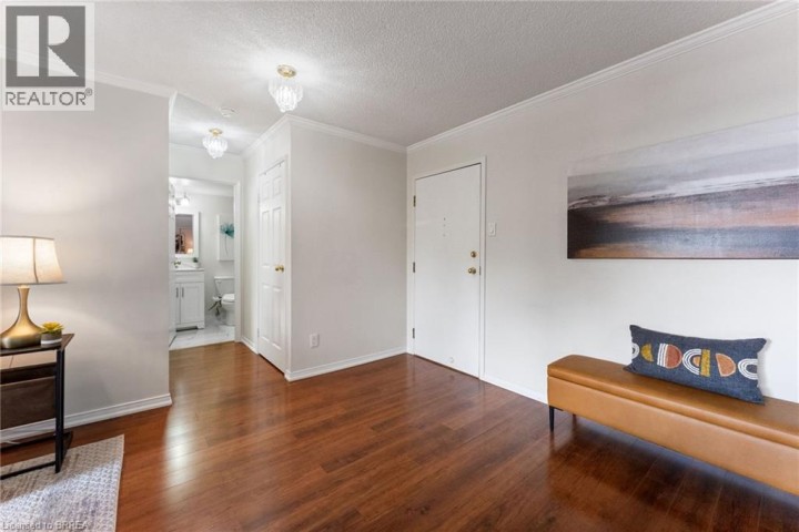 Photo 11 at 9 BONHEUR Court 212, Brantford
