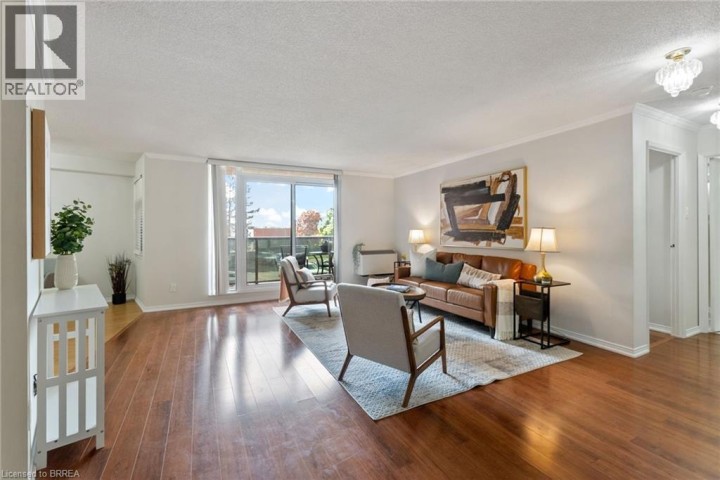 Photo 14 at 9 BONHEUR Court 212, Brantford