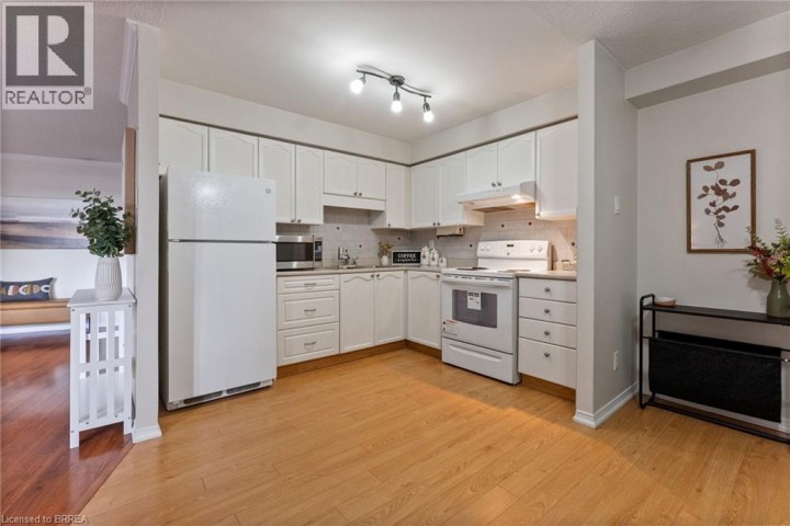 Photo 18 at 9 BONHEUR Court 212, Brantford