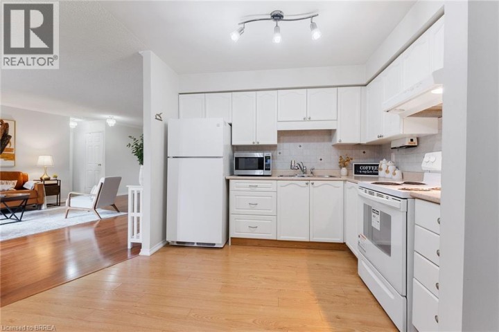 Photo 19 at 9 BONHEUR Court 212, Brantford