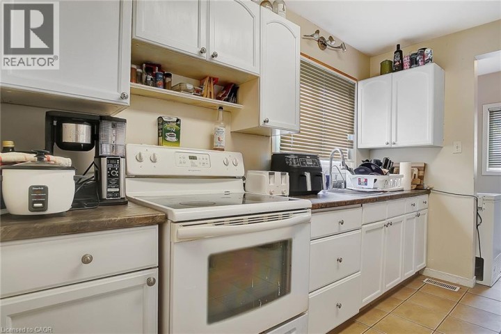 Photo 13 at 211 Dolph Street N, Cambridge