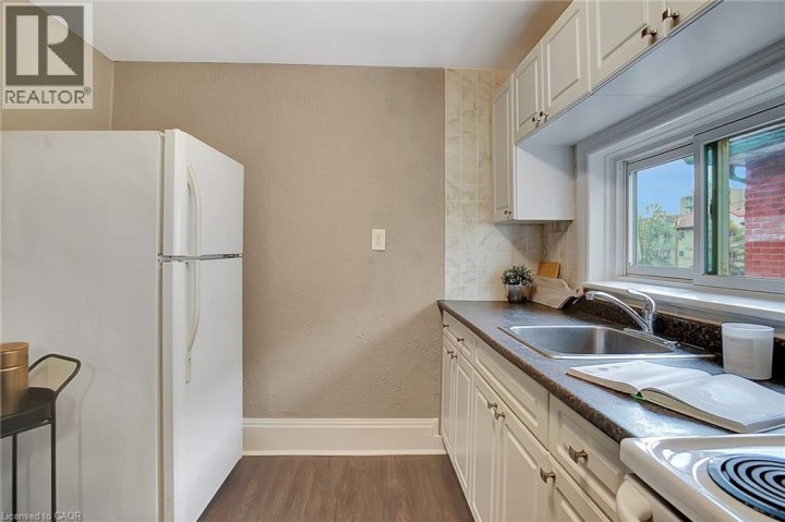 Photo 7 at 211 Dolph Street N, Cambridge