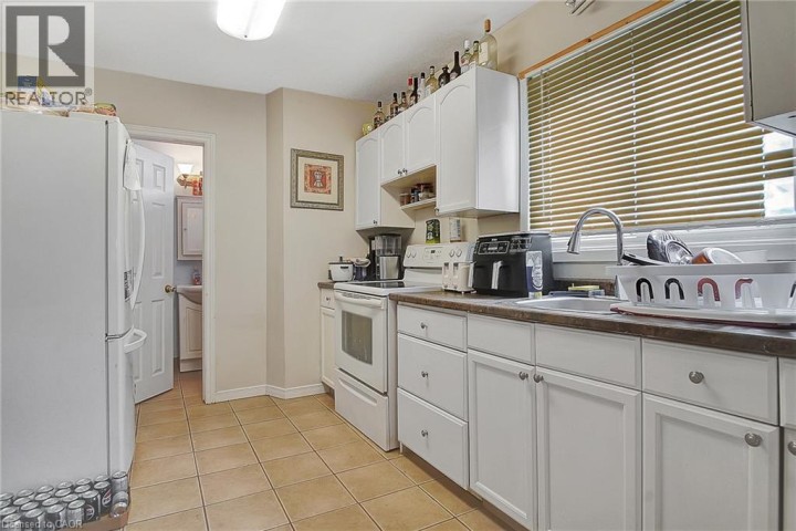 Photo 13 at 211 Dolph Street N, Cambridge