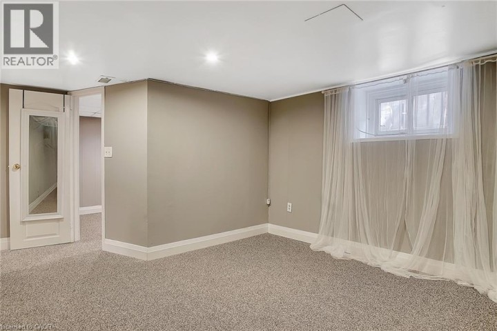 Photo 21 at 211 Dolph Street N, Cambridge