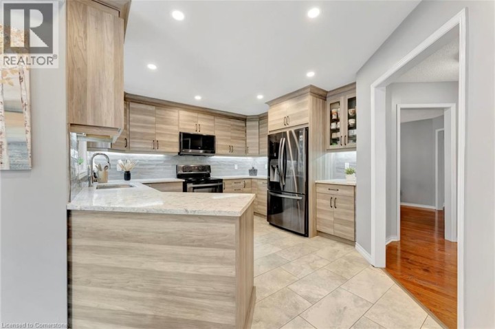 Photo 9 at 72 Hilborn Avenue, Cambridge