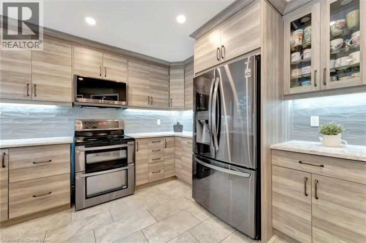 Photo 11 at 72 Hilborn Avenue, Cambridge