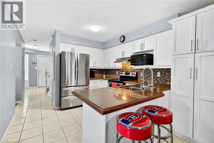 Photo 4 at 199 Gatehouse Drive, Cambridge