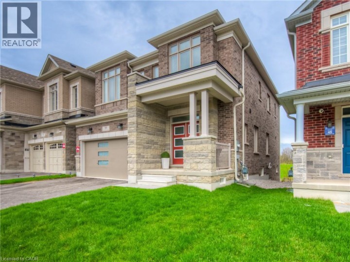 Photo 2 at 88 Bloomfield Crescent, Cambridge