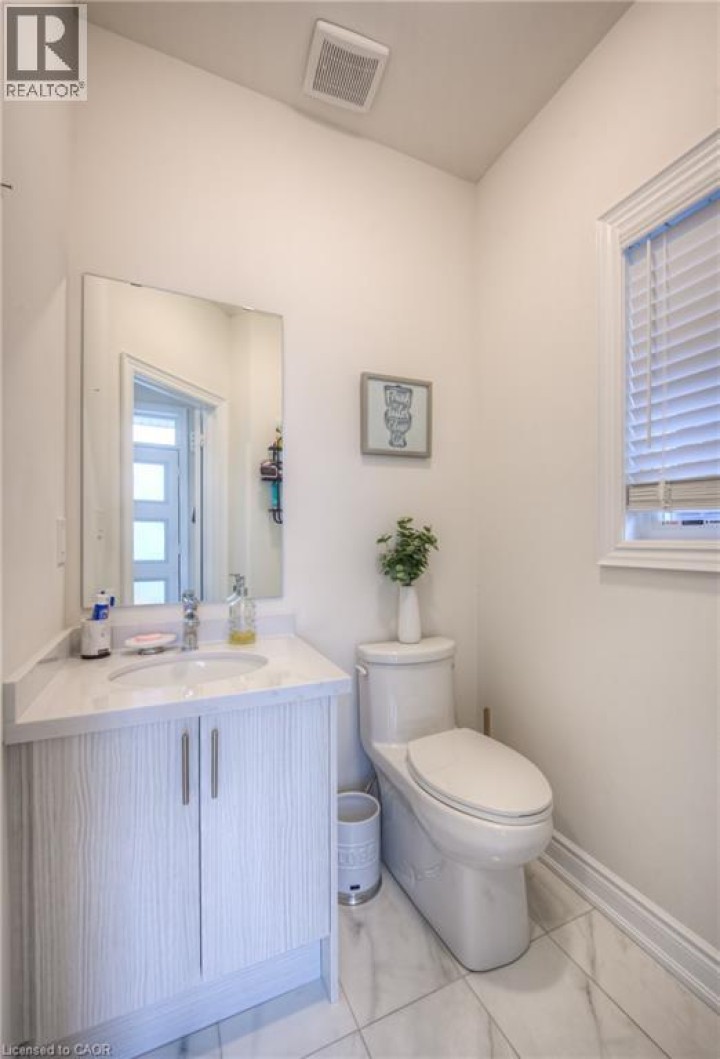 Photo 8 at 88 Bloomfield Crescent, Cambridge