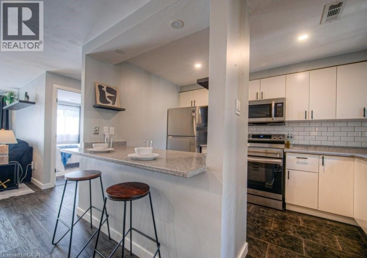 Photo 8 at 65 GLAMIS Road 83, Cambridge