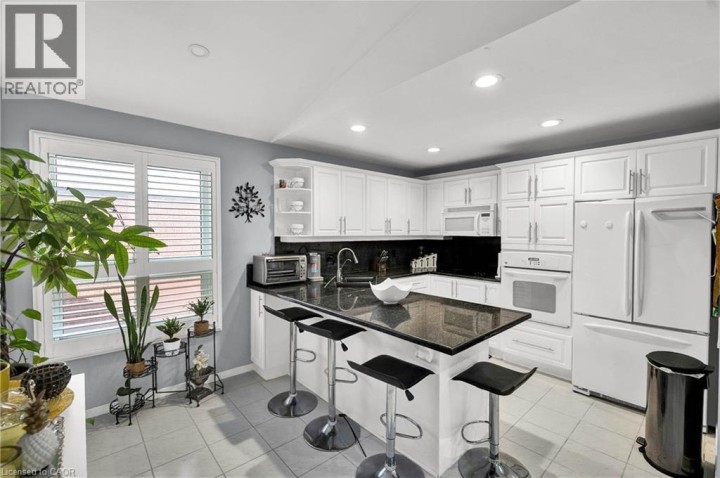 Photo 13 at 52 Dawn Crescent, Cambridge