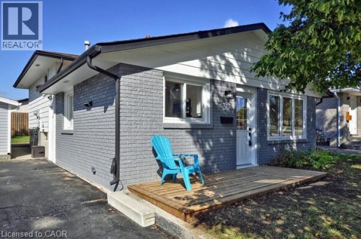 Photo 1 at 30 Grenadier Road, Cambridge