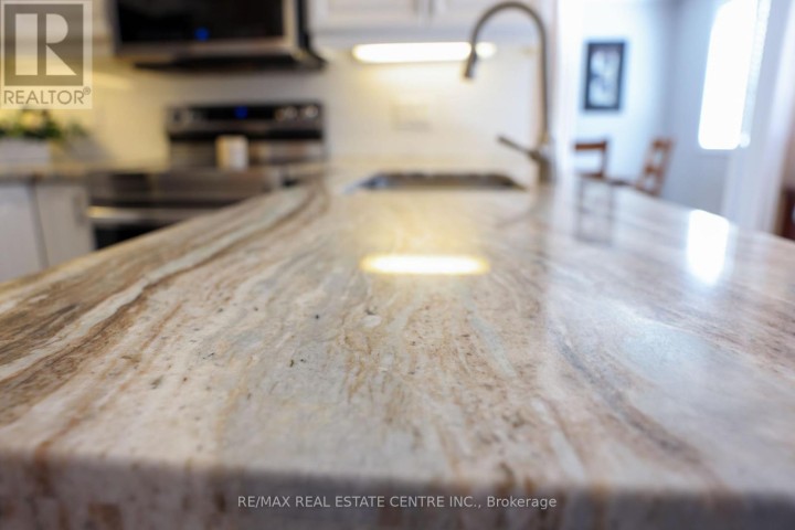 Photo 10 at 119 Hume Drive, Cambridge