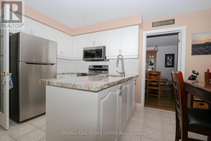 Photo 11 at 119 Hume Drive, Cambridge