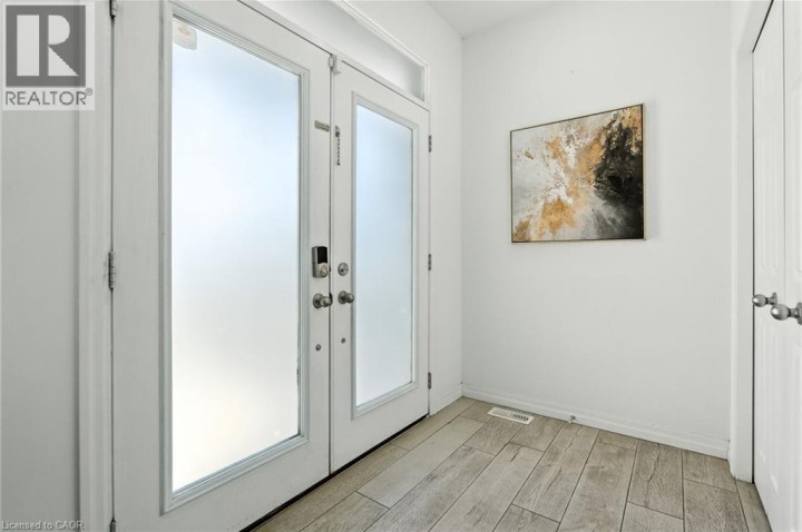 Photo 3 at 409 Freure Drive, Cambridge