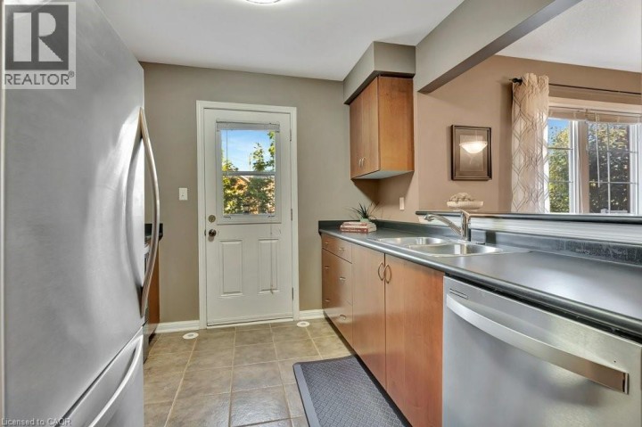 Photo 10 at 71 GARTH MASSEY Drive 79, Cambridge