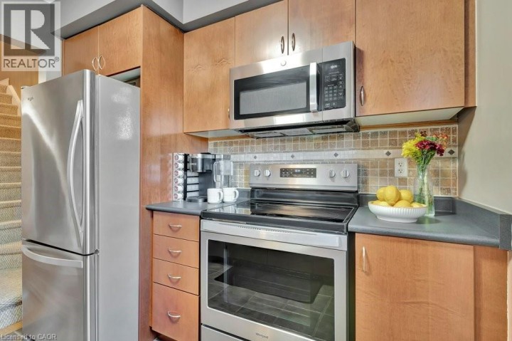 Photo 11 at 71 GARTH MASSEY Drive 79, Cambridge