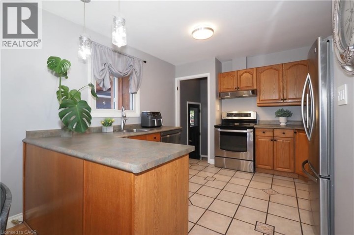 Photo 11 at 50 Highman Avenue, Cambridge