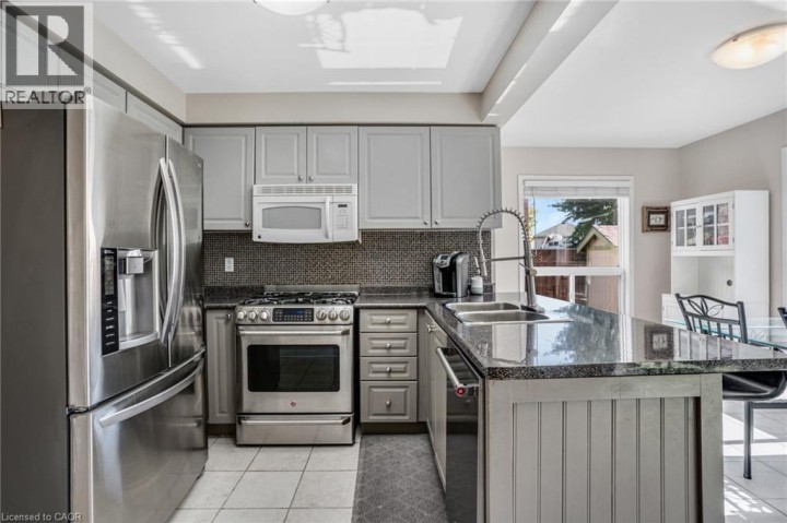 Photo 11 at 795 Saginaw Parkway, Cambridge