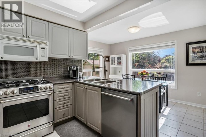 Photo 12 at 795 Saginaw Parkway, Cambridge