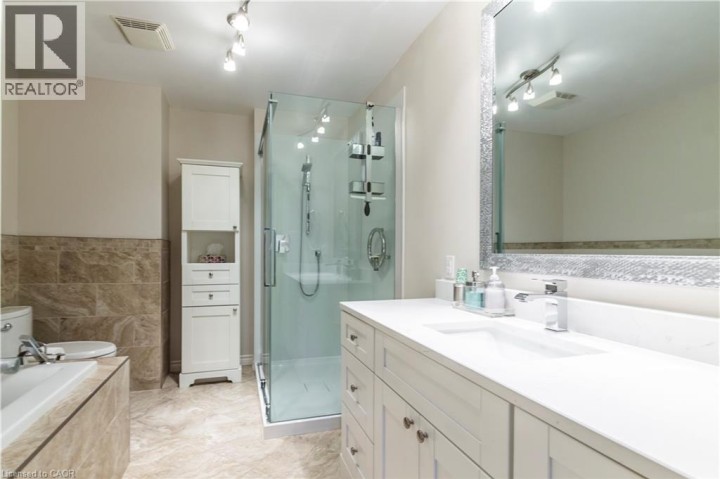 Photo 23 at 71 BEASLEY Crescent 16, Cambridge