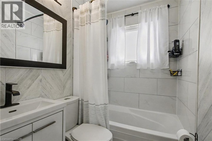 Photo 12 at 55 Highman Avenue, Cambridge