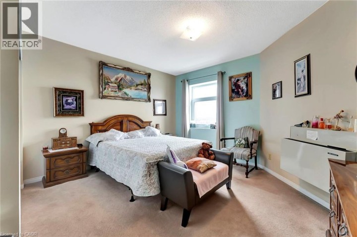 Photo 17 at 9 BONHEUR Court 902, Brantford