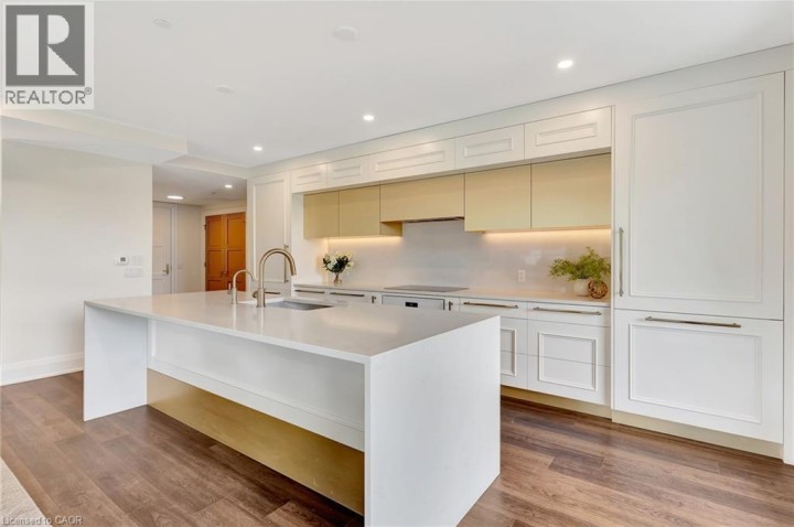 Photo 4 at 6523 WELLINGTON Road 7 206