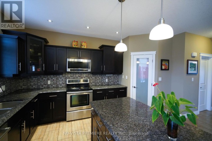 Photo 11 at 968 N Springbank Avenue N, Woodstock - North, Woodstock