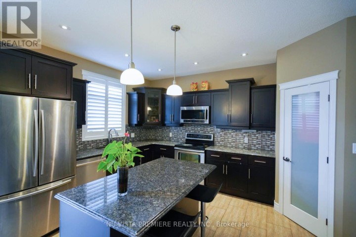 Photo 10 at 968 N Springbank Avenue N, Woodstock - North, Woodstock