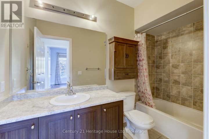 Photo 10 at 504 Baldwin Crescent, Woodstock - North, Woodstock