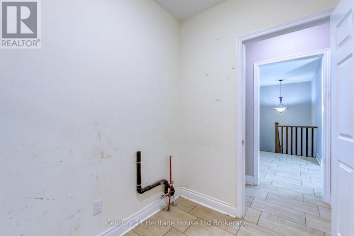 Photo 12 at 504 Baldwin Crescent, Woodstock - North, Woodstock