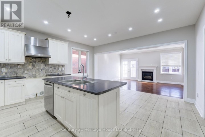 Photo 15 at 504 Baldwin Crescent, Woodstock - North, Woodstock