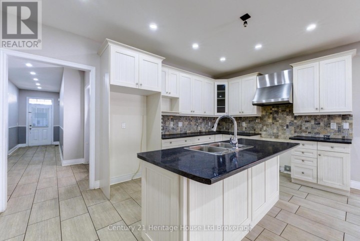 Photo 16 at 504 Baldwin Crescent, Woodstock - North, Woodstock