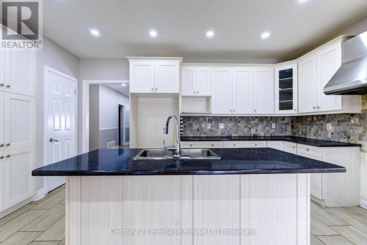 Photo 17 at 504 Baldwin Crescent, Woodstock - North, Woodstock