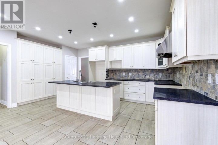 Photo 18 at 504 Baldwin Crescent, Woodstock - North, Woodstock