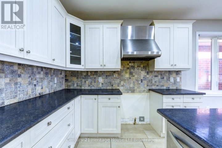 Photo 19 at 504 Baldwin Crescent, Woodstock - North, Woodstock