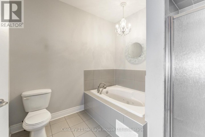 Photo 33 at 504 Baldwin Crescent, Woodstock - North, Woodstock