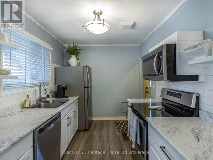 Photo 19 at 1064 Sovereign Road, Woodstock - North, Woodstock