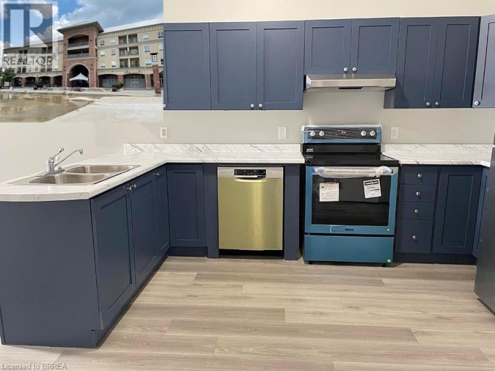 Photo 1 at 150 COLBORNE Street 407, Brantford