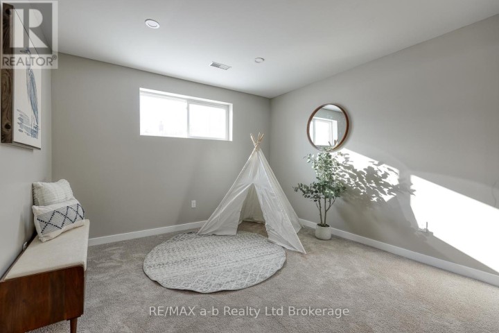 Photo 33 at 18 Bigham Crescent, Woodstock - South, Woodstock