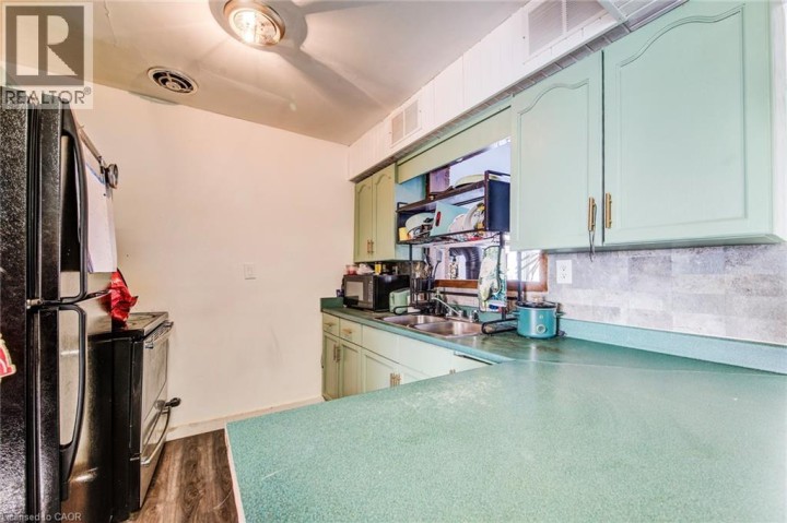 Photo 9 at 393 Odlum Drive, Woodstock - South, Woodstock