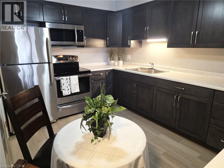 Photo 6 at 106 - 565 Greenfield Avenue, Fairview / Kingsdale, Kitchener