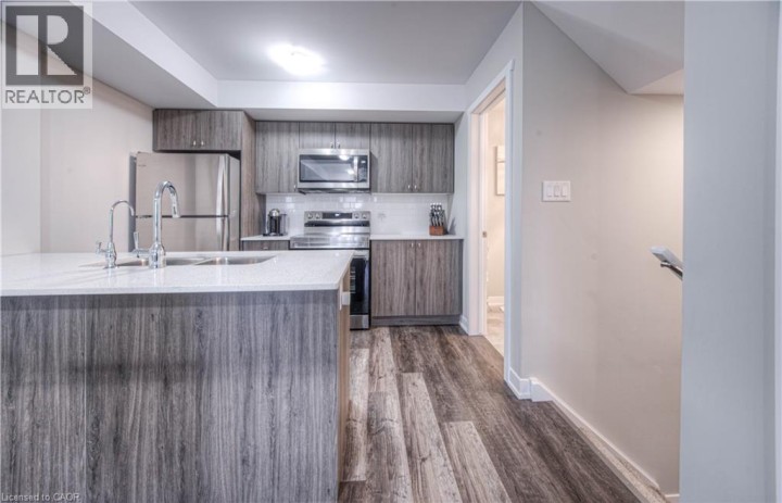 Photo 8 at A11 - 1331 Countrystone Drive, Beechwood Forest / Highland W., Kitchener