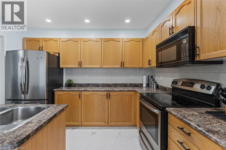 Photo 13 at 70 Blackburn Drive, Empire, Brantford