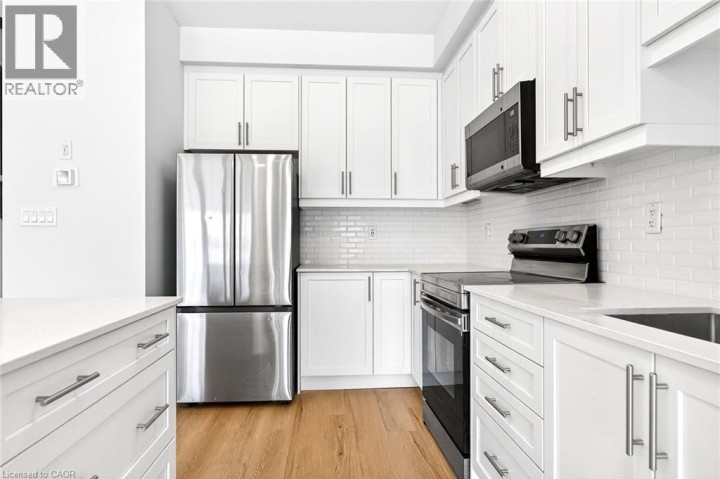 Photo 11 at 10 June Callwood Way, Empire South, Brantford