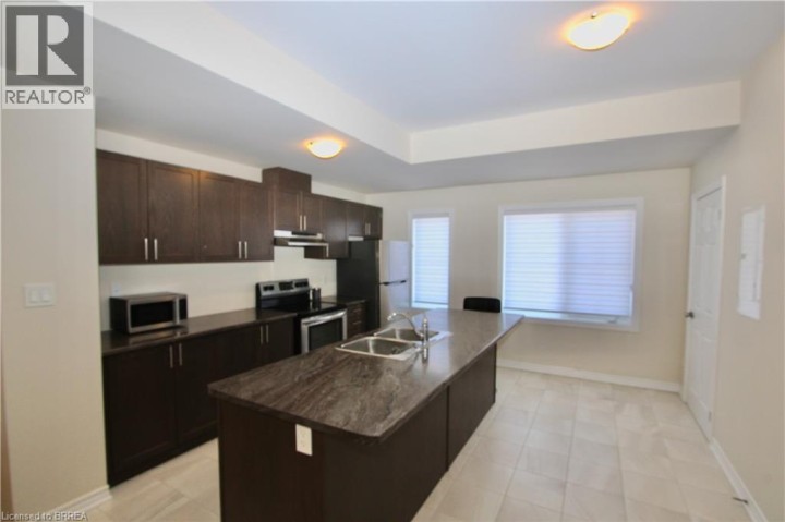 Photo 3 at 13 - 677 N Park Street, Cedarland, Brantford