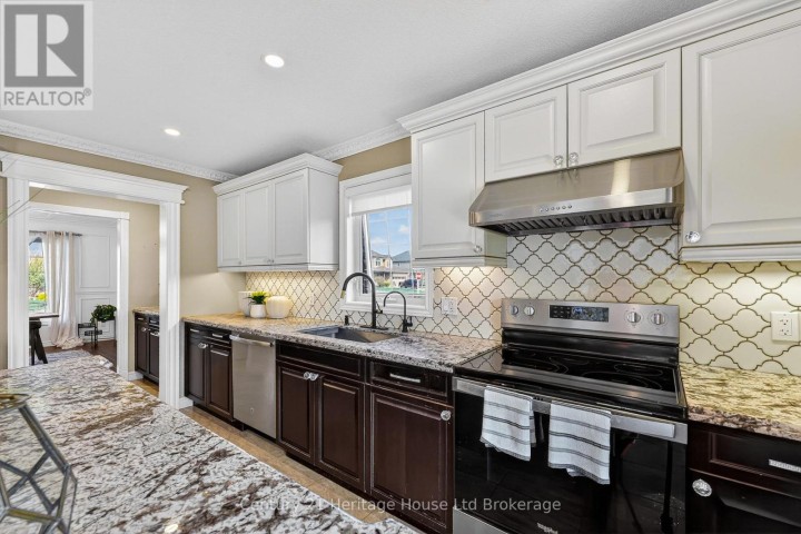 Photo 14 at 717 Normandy Drive, Woodstock - North, Woodstock