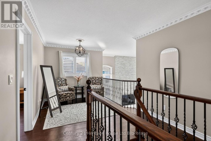 Photo 22 at 717 Normandy Drive, Woodstock - North, Woodstock